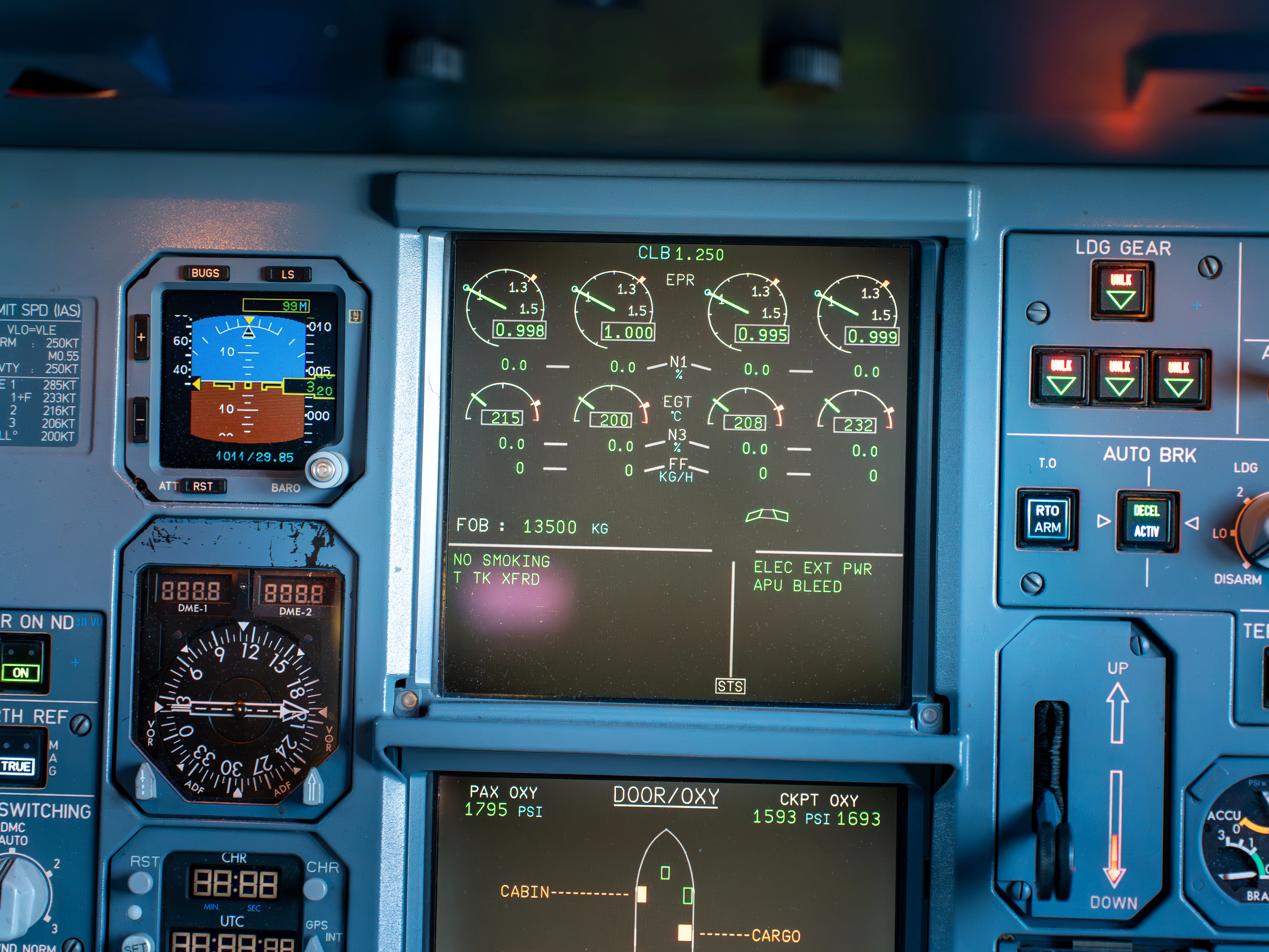 Close-up of the engine display showing four sets of engine gauges, a reminder of the four-engine era, next to the standby instruments and gear lever