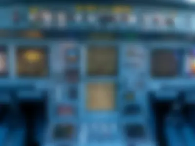 The full A340-600 main instrument panel, with the central engine and system displays and the registration D-AIHW
