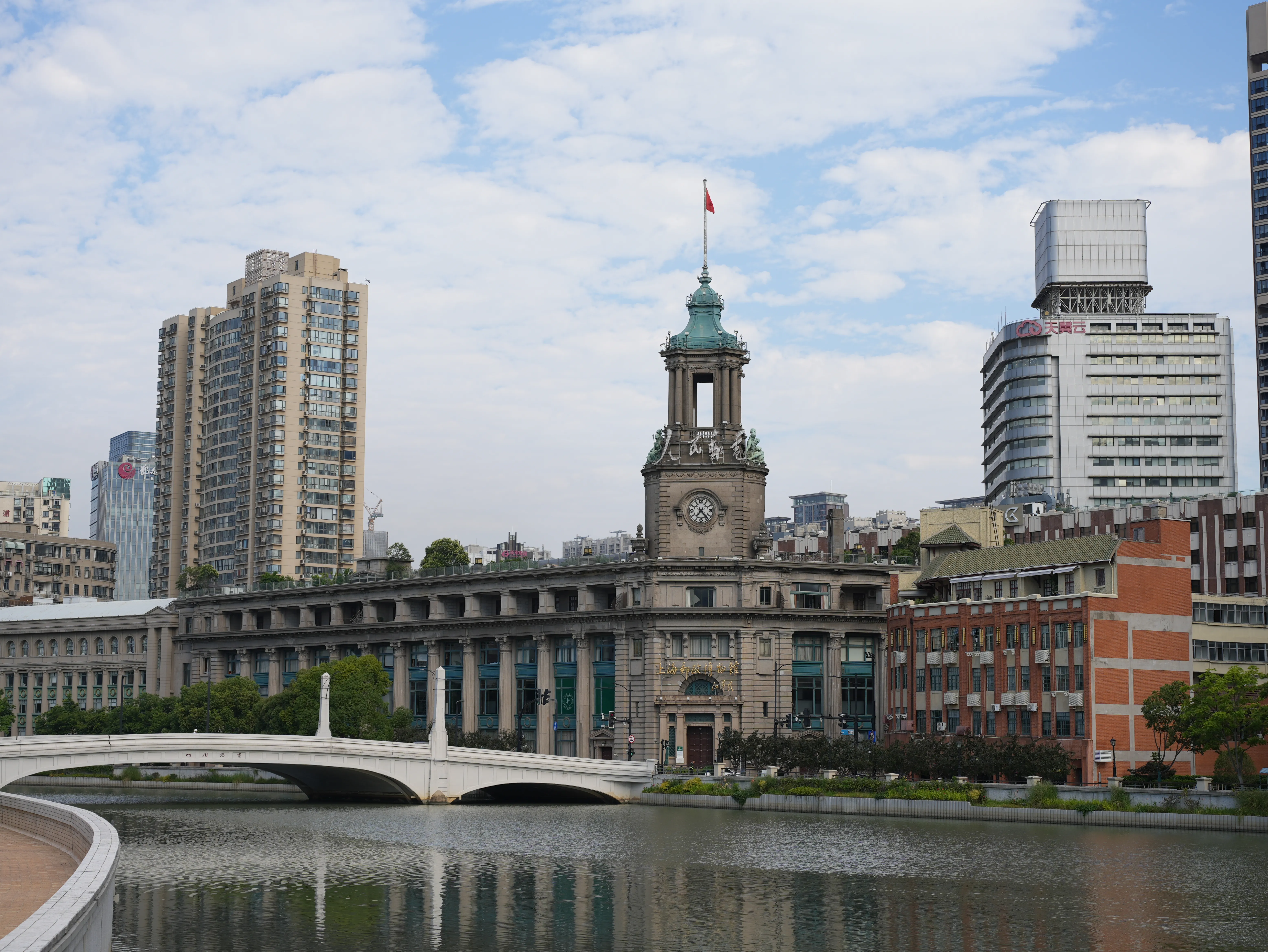 Suzhou Creek, Zhejiang Road Bridge and Shanghai Postal Museum with its name inscribed by JIANG Zeming